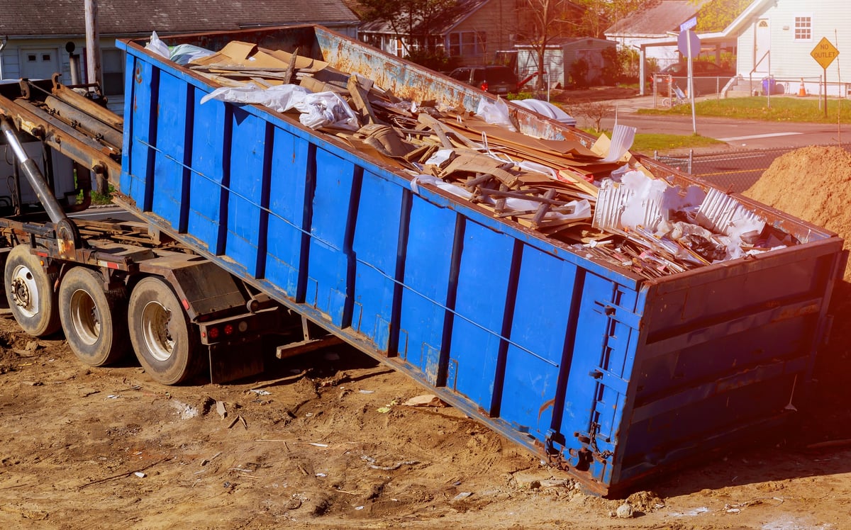 Loaded debris container ready for hauling on a cleanup job